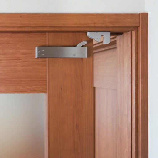 KURIKI Japan close-up of soft closing kit installed on an interior sliding door